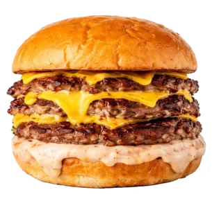 Saftiger Smash Burger mit smashed Rindfleisch, geschmolzenem Cheddar, karamellisierten Zwiebeln, Gewürzgurken und hausgemachter Sauce. Kräftig, saftig und besonders beliebt.